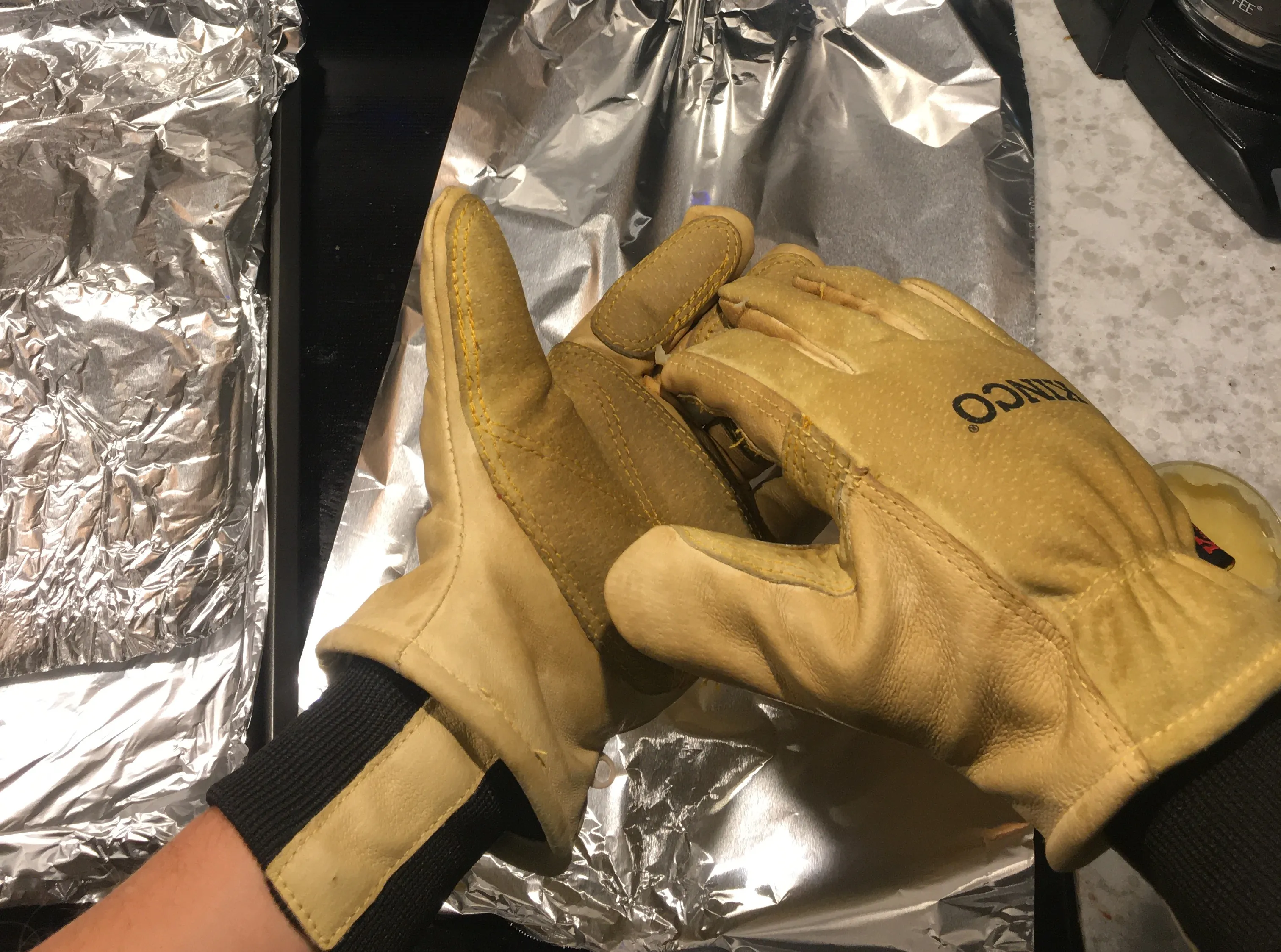 Applying wax to gloves