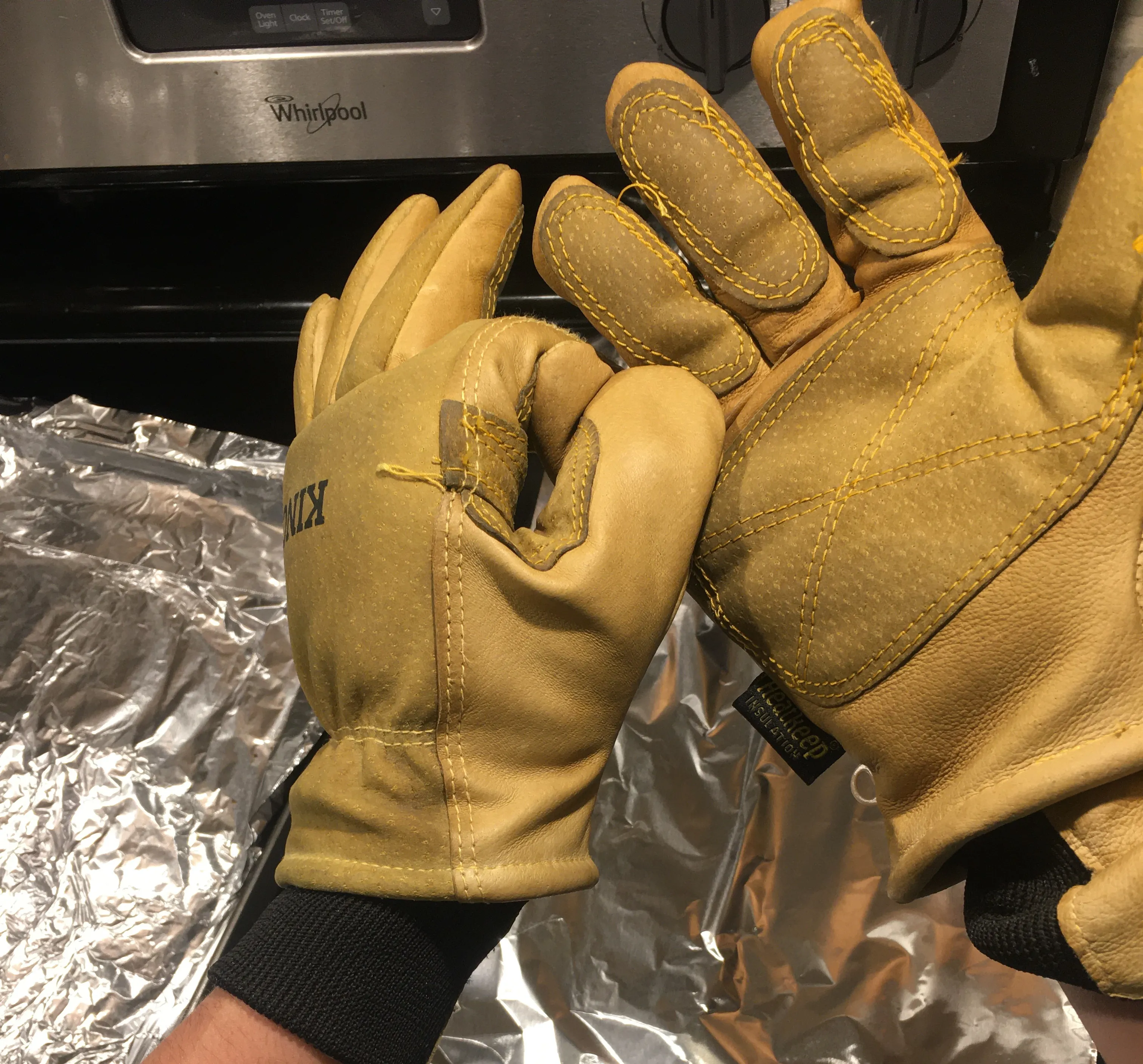 Applying wax to seams of gloves